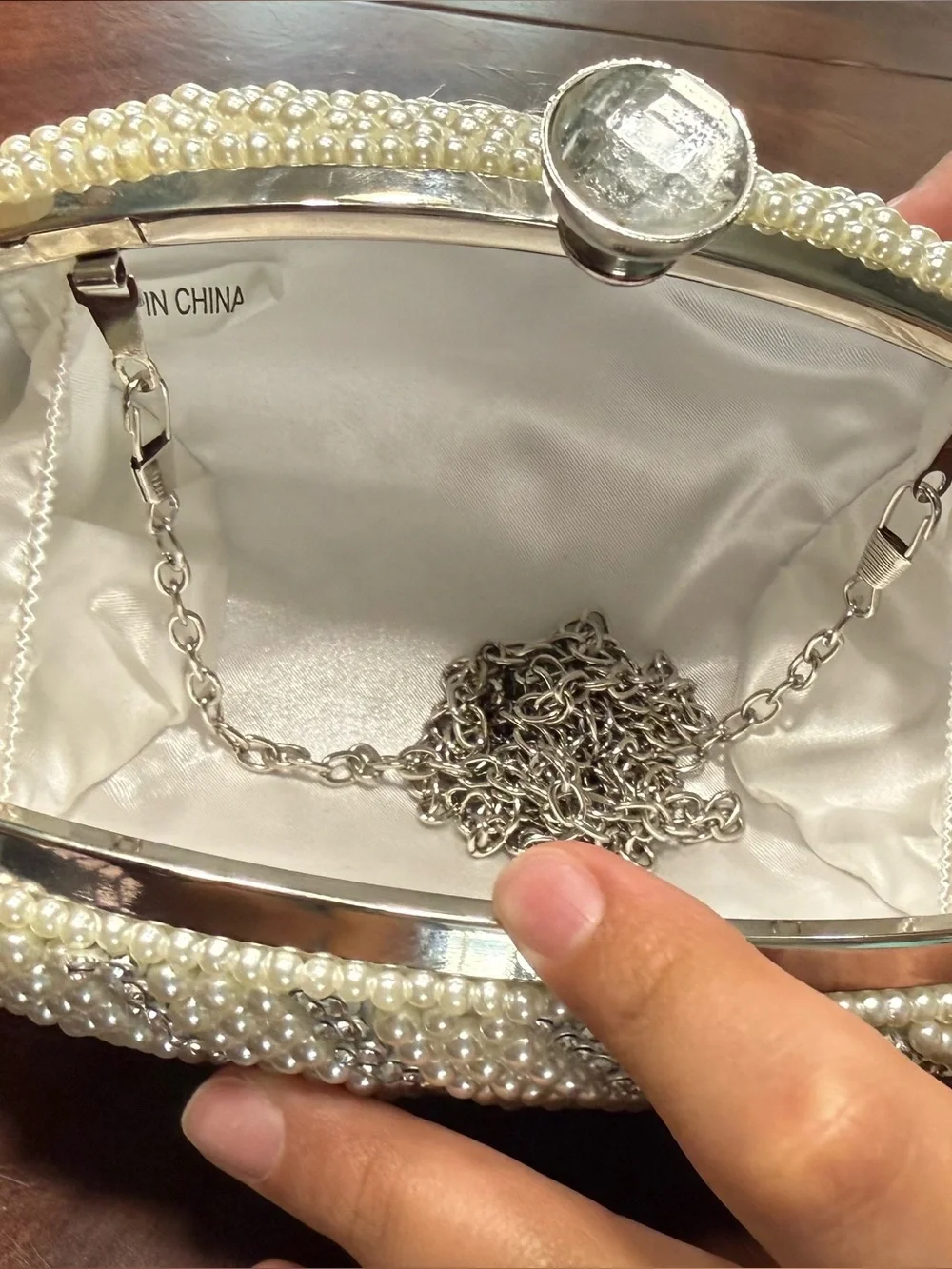 Pearl-Embellished Ivory Evening Clutch with Silver Frame